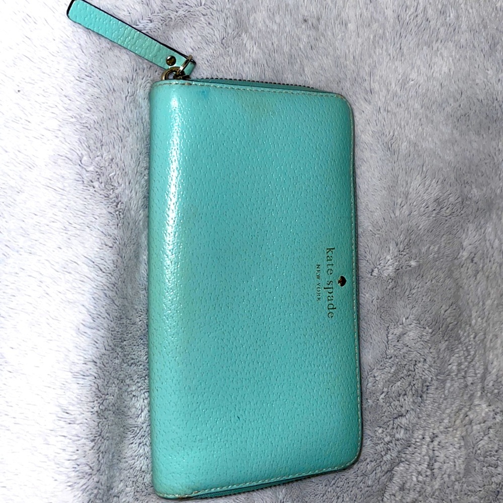 SOLD Roulette zip around continental wallet.